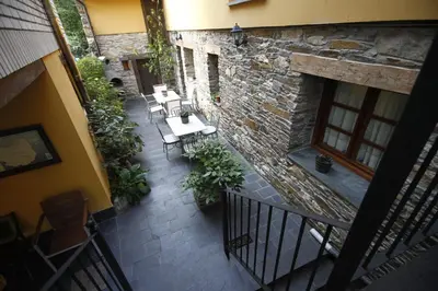 an overhead view of a patio with tables and chairs at Casa Xuaquin in Moal