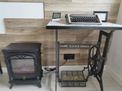 a desk with a computer and a stove at BALCON DEL EO in Ribadeo