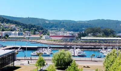 a view of a marina with boats in the water at El Mirador 2 in Vivero