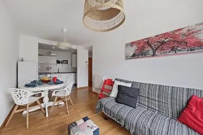 a living room with a couch and a table at Apt. p/4 en la Playa de Viveiro in Viveiro