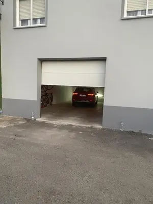 a car is parked inside of a garage at Casa Roque in Monforte de Lemos