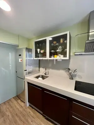 a kitchen with a sink and a refrigerator at Piso en pleno centro de Miño izquierda in Miño