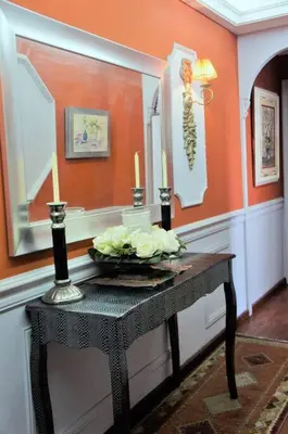 a table with two candles on it in a room at Apartamento Lugo Centro in Lugo