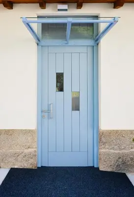 a blue front door of a building at O Souto da Aldea Ribeira Sacra Parada de Sil in Parada del Sil