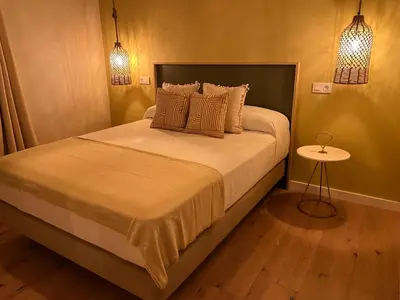 a bedroom with a bed and a television in it at Casal de pelaio in Barreiros