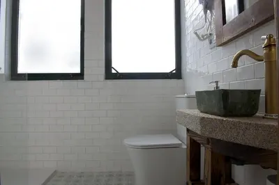 a bathroom with a sink and a toilet at PENSION SOBRADO in Porta