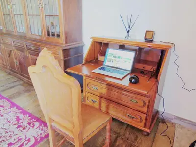 a desk with a laptop computer on top of it at Casa de Ribeira Sacra in Pantón