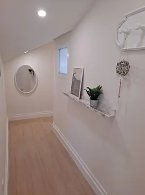 a room with a white wall and a mirror at Catedral y Muralla a 50 metros - VUT-LU-02907 in Lugo