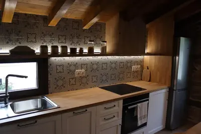 a kitchen with a sink and a counter top at Casa Fente in Taboada