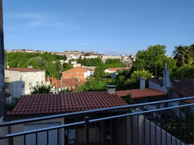 a view of a city from a balcony at Apartamento Salvadas in Santiago de Compostela