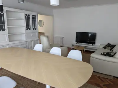 a living room with a table and a couch and a tv at Mirador de Ferradores in Betanzos