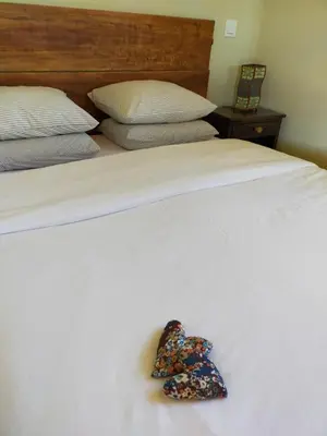 a pair of panties sitting on a white bed at Pension Gabino (rooms) in El Ganso