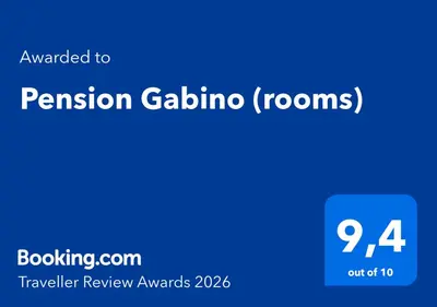 a blue sign with the words permission galina and the number at Pension Gabino (rooms) in El Ganso