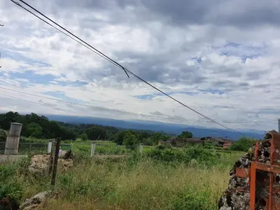 a view of a field with mountains in the distance at Casa Manuel in Toldaos