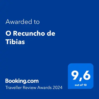 a screenshot of a cell phone with the text awarded to robinia de tib at O Recuncho de Tibias in Pereiro de Aguiar