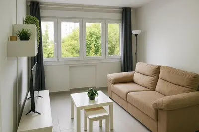 a living room with a couch and a table at Viveiro MSuites in Viveiro