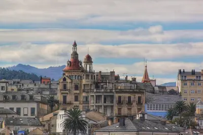 a group of buildings in a city with buildings at Preciosa casa en Ribadeo in Ribadeo