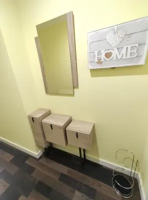a bathroom with a sink and a mirror at Apartamento Tamarisco in Foz