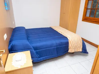 a large blue inflatable bed in a room at Casa Manolo Camiño Do Santiaguiño in Vedra