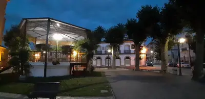 a building at night with a street in front at Entre Las Catedrales Campo y Mar 1 y 2 in Lourenzá
