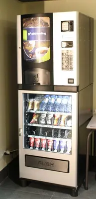a large refrigerator with drinks and sodas at ESTRELA DO CAMIÑO in Palas de Rei