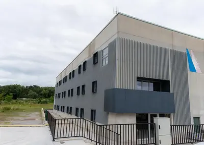 a building with a black fence in front of it at ESTRELA DO CAMIÑO in Palas de Rei