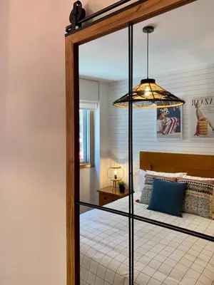 a bedroom with a bed with a glass canopy at Andainas C in Milladoiro