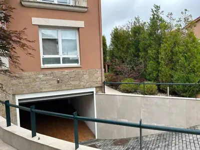 a building with a tunnel in the side of it at Excepcional chalet en Perbes. in Miño