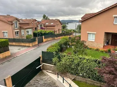 a view of a street in a residential neighborhood at Excepcional chalet en Perbes. in Miño