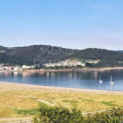 two boats in the water on a body of water at Marusia in Viveiro