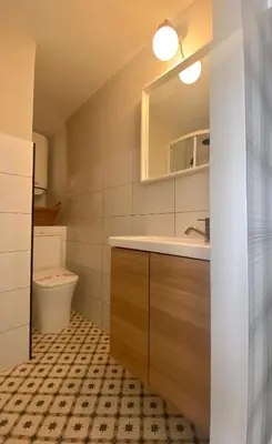 a bathroom with a sink and a toilet at Casita típica de pescadores -Casa Gloria- WIFI in Burela de Cabo