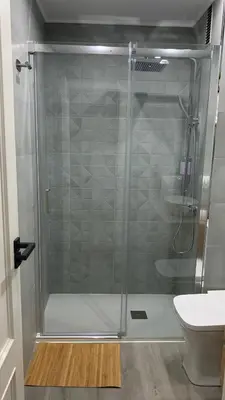 a shower with a glass door in a bathroom at Casa da Alfóndega in Caldas de Reis
