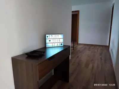 an office with a desk with a laptop on top of it at Mondariz Donde el Agua es Vida in Mondariz