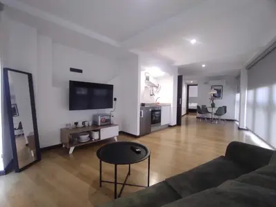 a living room with a couch and a flat screen tv at 3. Amplio y muy luminoso para disfrutar de Ourense in Ourense