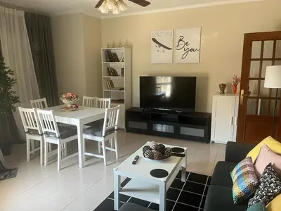 a living room with a couch and a table at Piso pineda in Monforte de Lemos