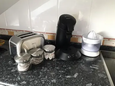 a kitchen counter with a toaster and other appliances at TEMPLE in Ponferrada