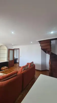 a living room with a couch and a table at San Roque Lucus Confort in Lugo