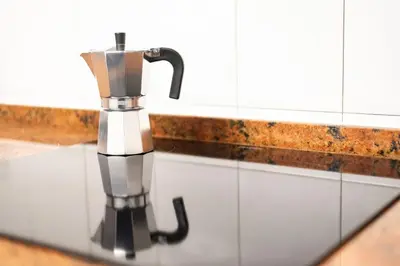 a kitchen counter top with a chrome sink at Apartamento Carmiña in Puentedeume