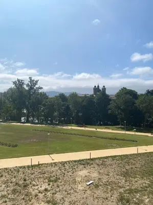 a park with a field and trees in the background at O Lar de Jose in Monforte de Lemos