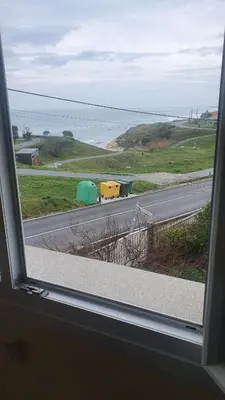 a view from a window of a road with a truck at Grecia in Barreiros