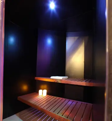a room with two candles on a wooden shelf at Hotel Las Treixas in Puebla de Sanabria