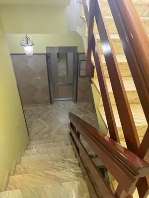 a staircase in a house with wood flooring at Apartamento moderno en Valga ideal para peregrinos y familias, junto al Camino de Santiago in Pontevedra