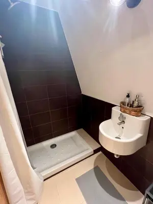 a bathroom with a sink and a toilet at Ático Camino Santiago: El Comienzo Perfecto in Sarria