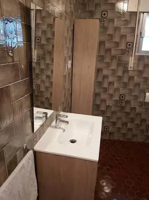 a bathroom with a sink and a mirror at Casa Ricardo (16km de Coruña) in Castro