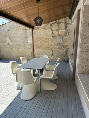 a table and chairs sitting on a patio at Maior 5 Apartamentos in Verín