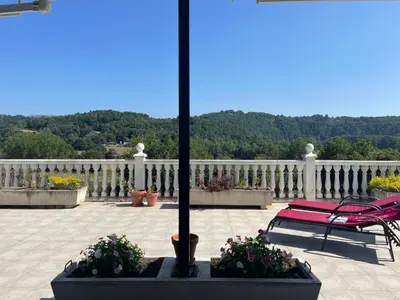 a red bench on a porch with a white fence at Casa Acougo, Sarria in Sarria