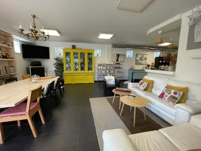 a living room with a couch and a table at Casa Acougo, Sarria in Sarria