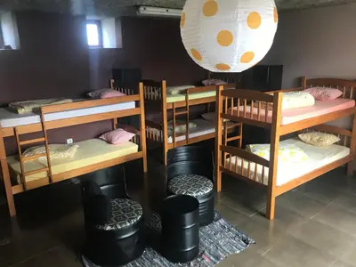 a group of bunk beds in a room at Albergue Gabino in El Ganso