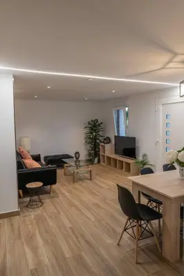 a living room with a couch and a table at Casa Tía Pepa in Castenda