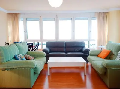 a living room with two couches and a coffee table at Pastor Diaz Home in Viveiro